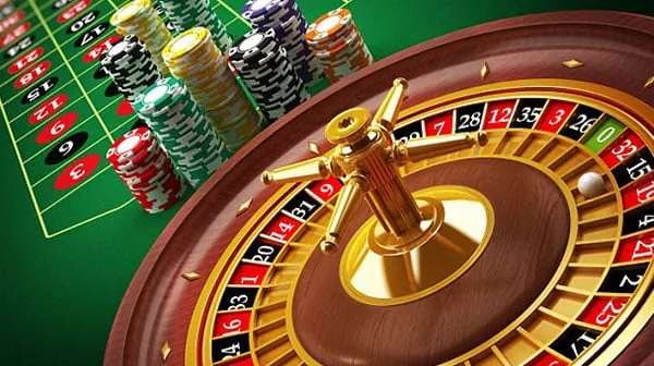 JiliBet App live casino dealer at a roulette table